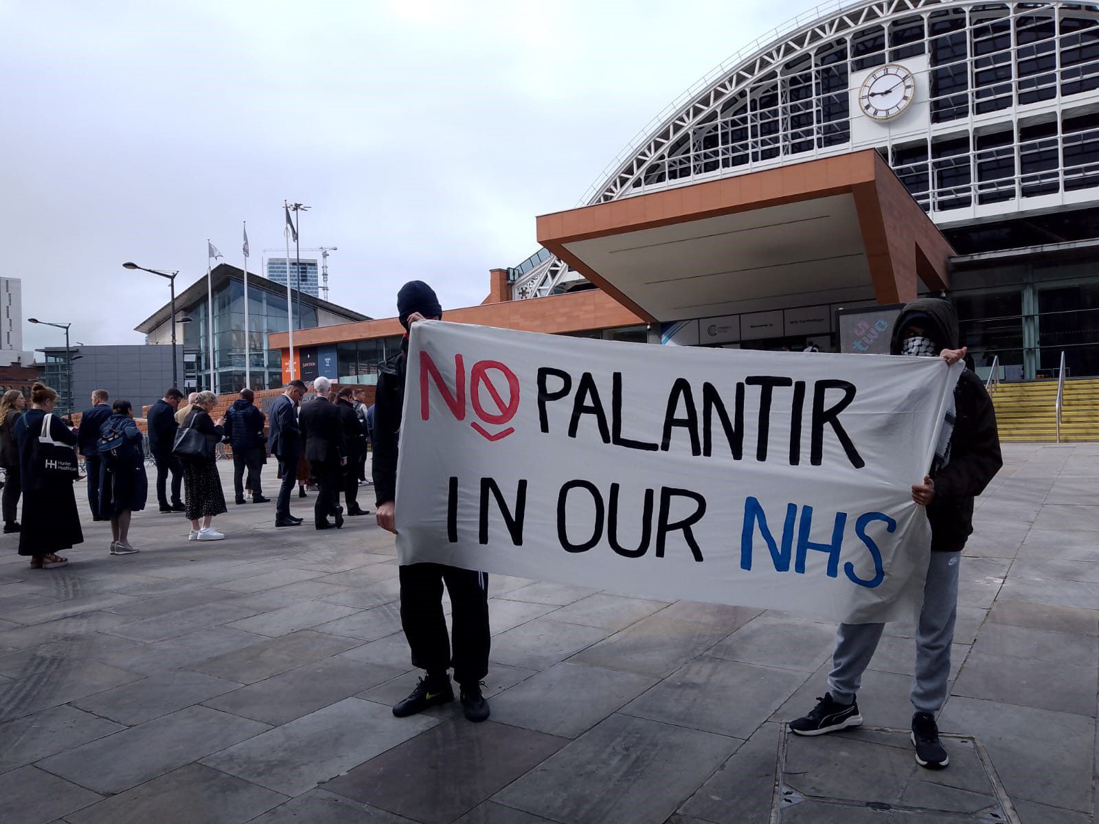 Campaigners protest against Palantir at NHS Confed Expo